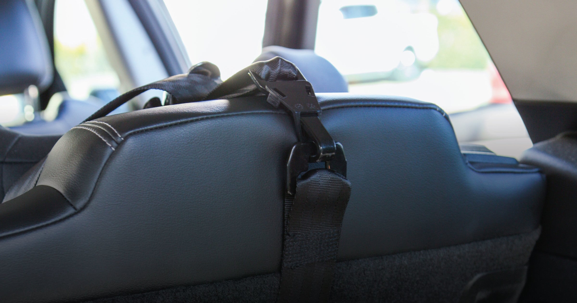 Isofix tether clearance strap